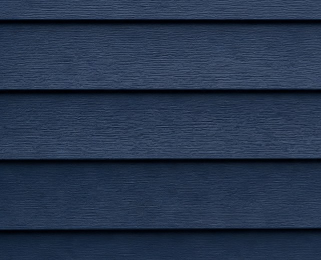 Deep navy vinyl siding swatch pairing with white trim